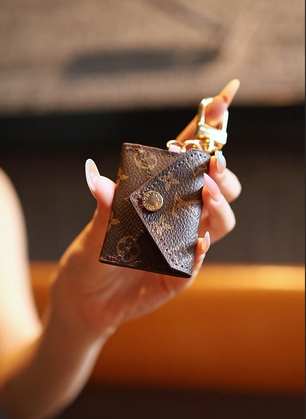 Keychain phone bag crafted by a celebrity designer