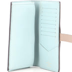 Capucines Vertical Wallet Leather