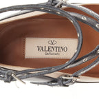 Women's Valentino leather silver grommet stud bondage harness pump