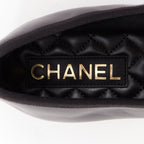 Women's Chanel black soft lambskin stitched CC cap toe flats