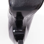 Women's Givenchy curved horn heel black ankle boots