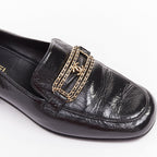 Women's Chanel black textured calfskin gold CC chain link moccasin