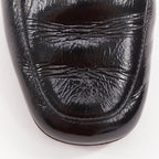 Women's Chanel black textured calfskin gold CC chain link moccasin