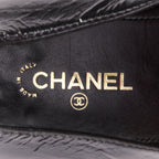 Women's Chanel black textured calfskin gold CC chain link moccasin