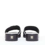 Women's Chanel black white logo embroidered lambskin heeled mules