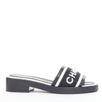 Women's Chanel black white logo embroidered lambskin heeled mules