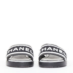 Women's Chanel black white logo embroidered lambskin heeled mules