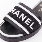 Women's Chanel black white logo embroidered lambskin heeled mules