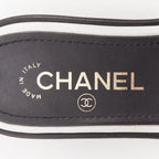 Women's Chanel black white logo embroidered lambskin heeled mules
