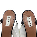 Women's Alaïa Cœur Slingback Pumps in Black PVC