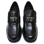 Women's Prada Triangle Logo Loafers in Black Patent Leather