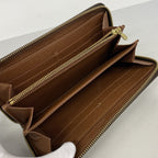 Zippy Wallet Monogram Canvas