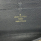 Clemence Wallet Monogram Empreinte Leather